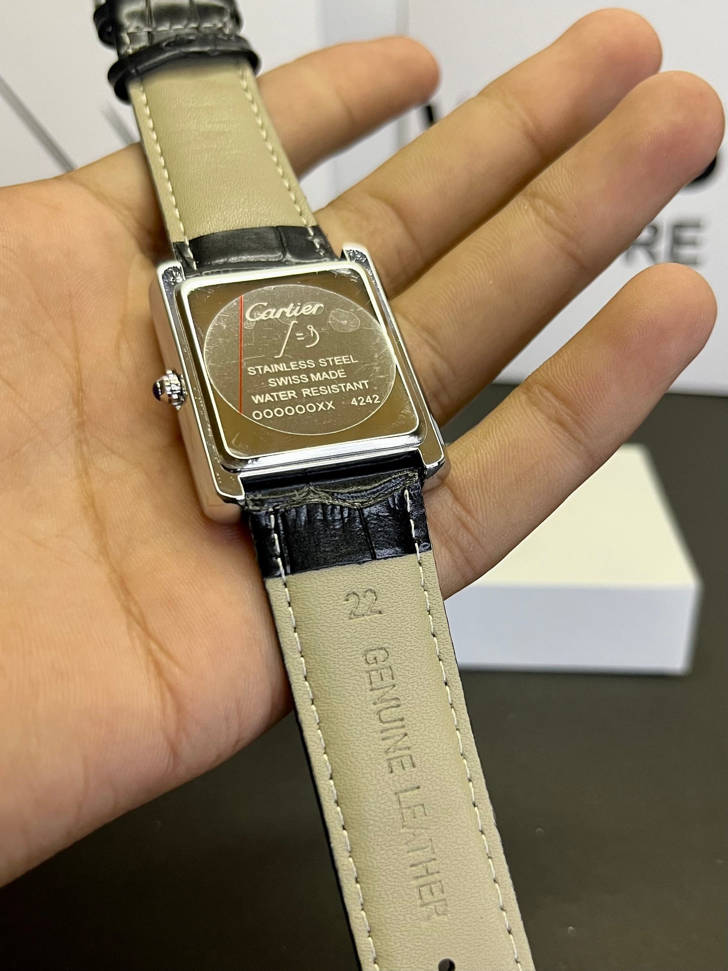 Cartier Tank Watch with white dial