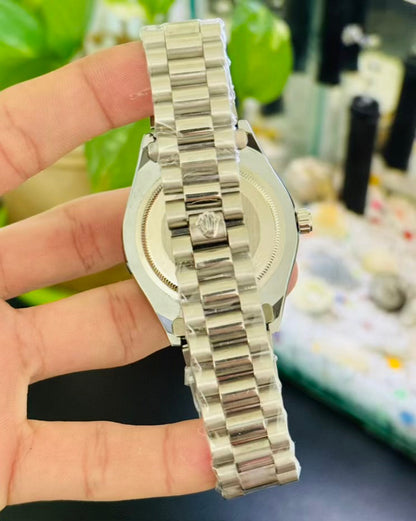 Day Date silver with white dial Rolex