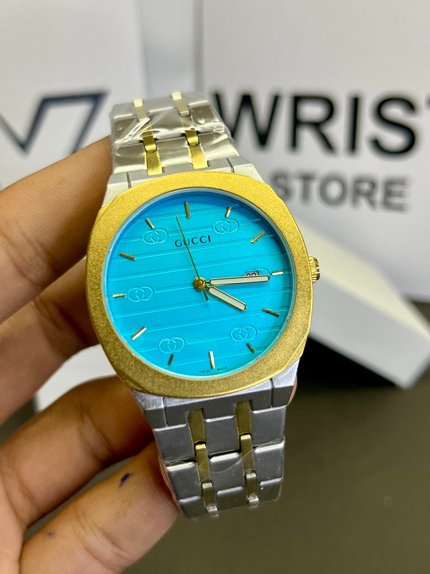 Gucci two tone with light blue dial