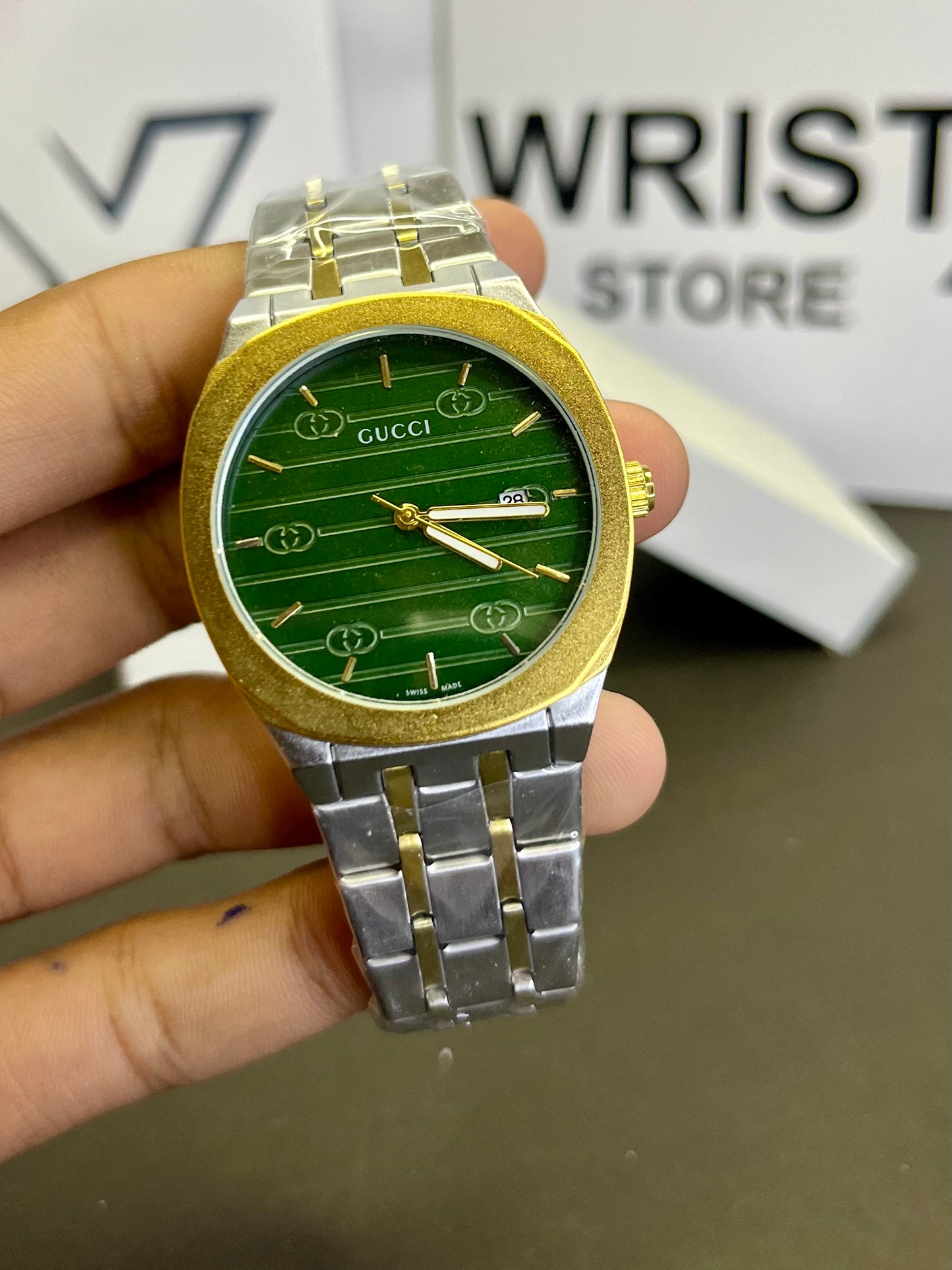 Gucci two tone with green dial