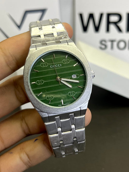 Gucci silver with green dial