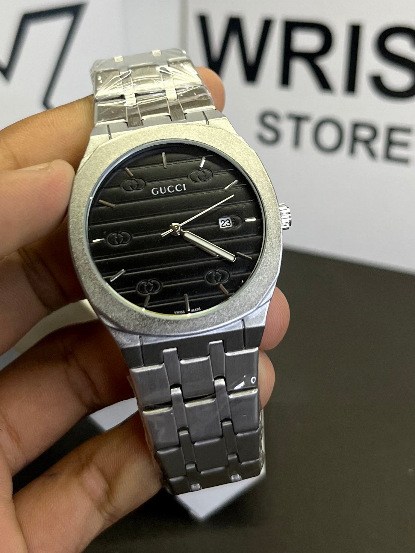Gucci silver with black dial