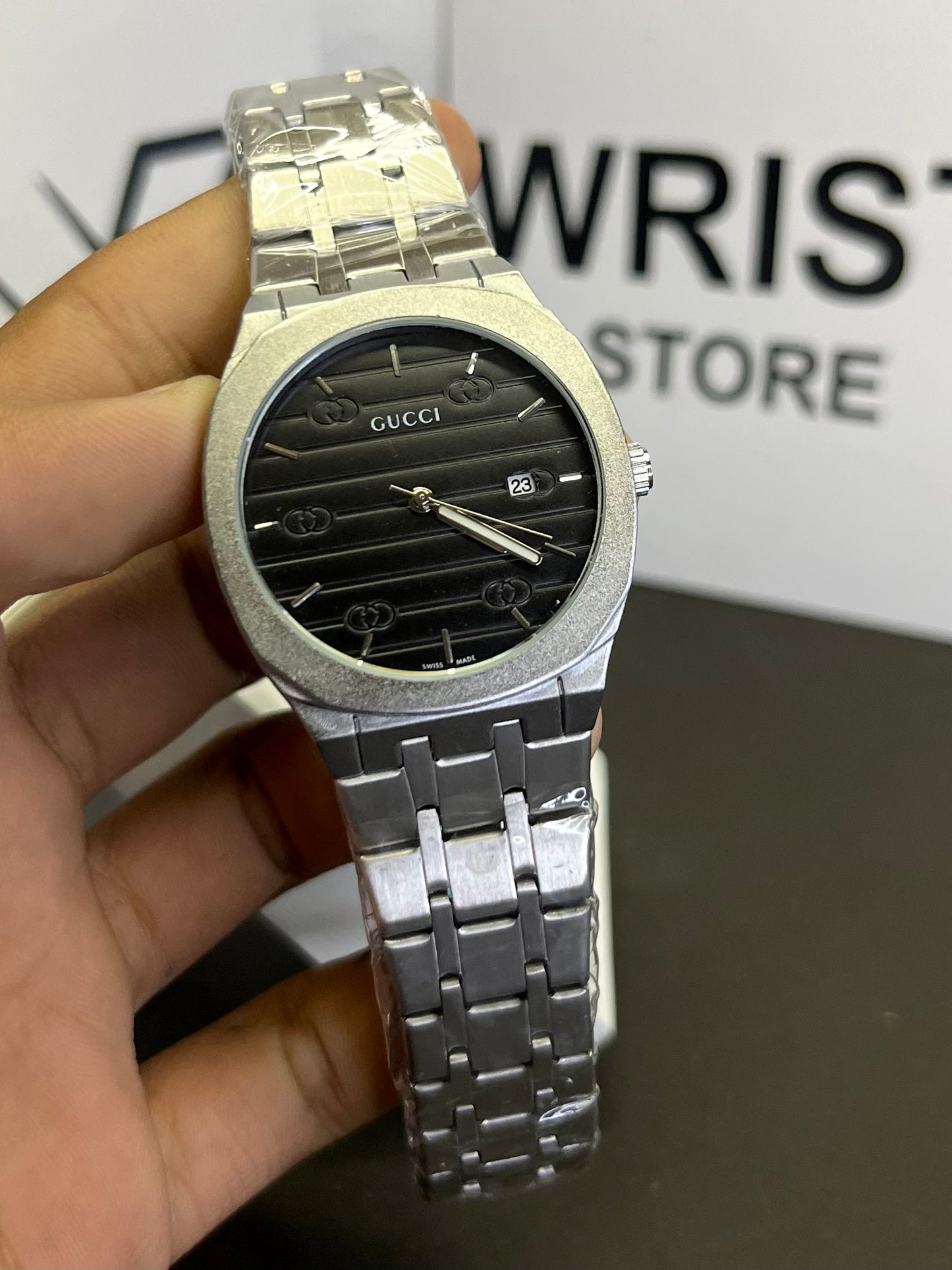 Gucci silver with black dial