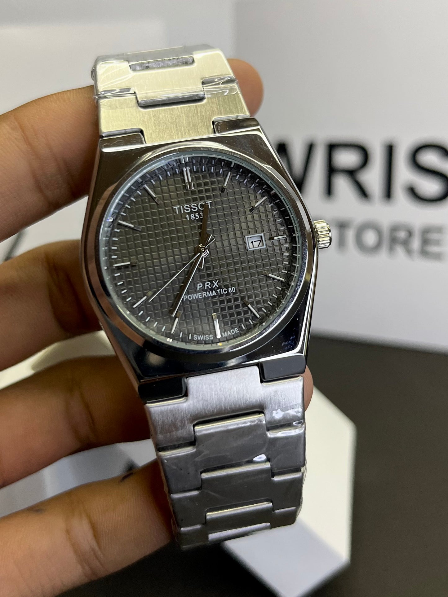 Tissot silver with black dial