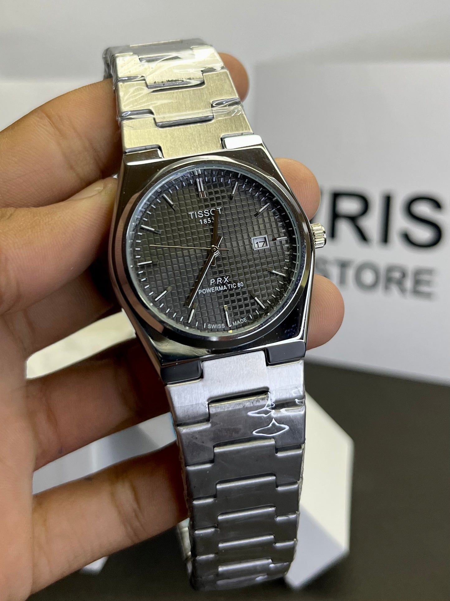 Tissot silver with black dial