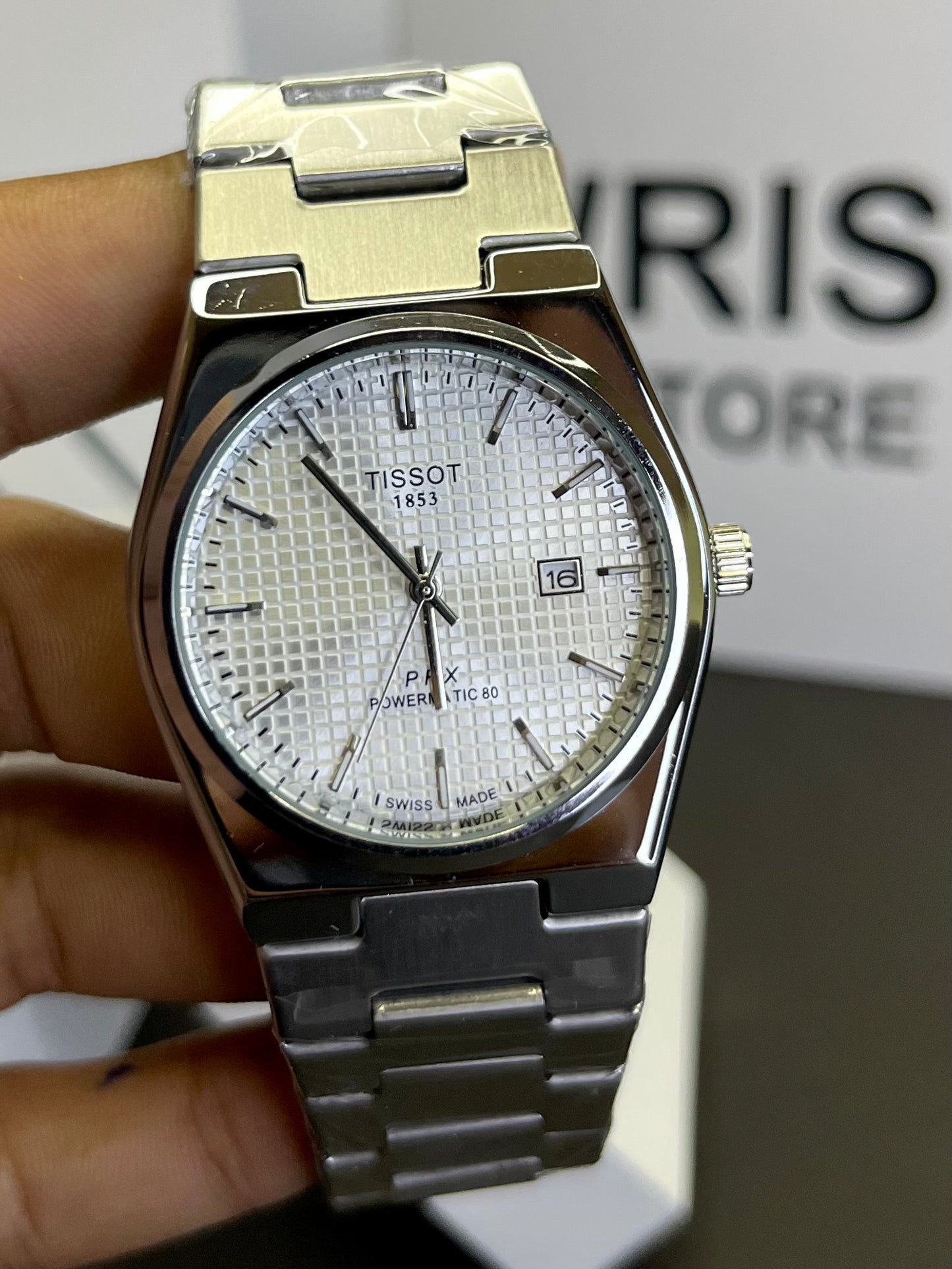 Tissot silver with white dial