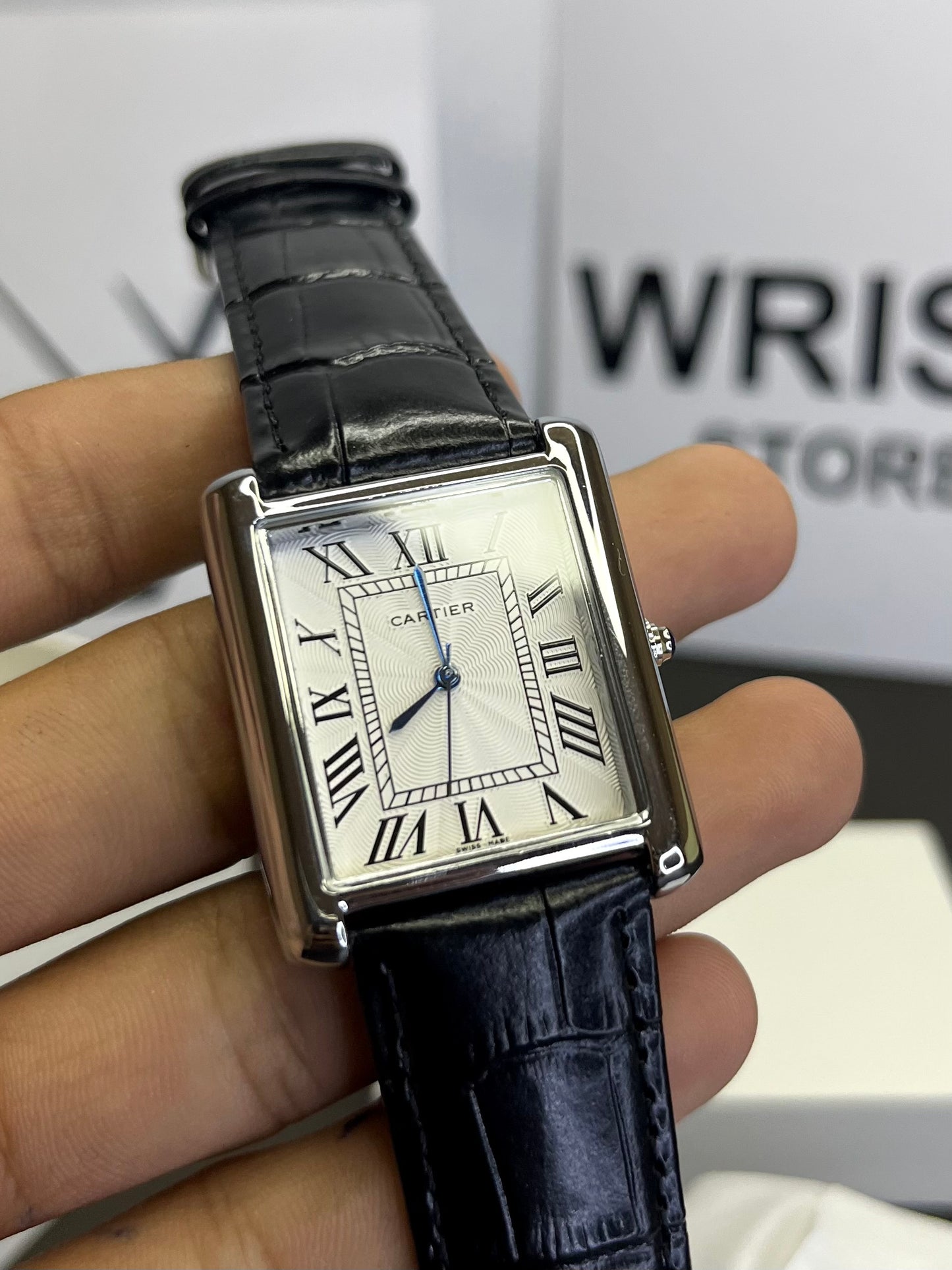 Cartier Tank Watch with white dial