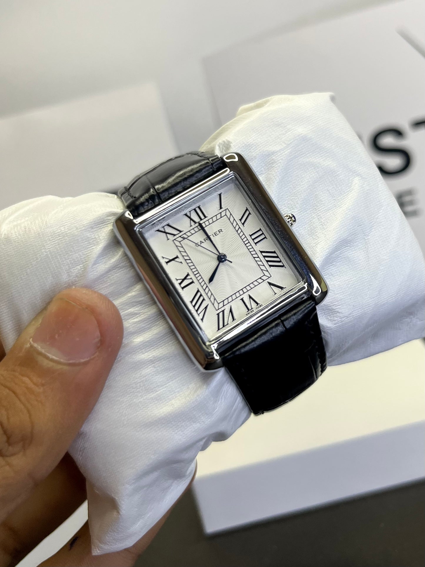 Cartier Tank Watch with white dial