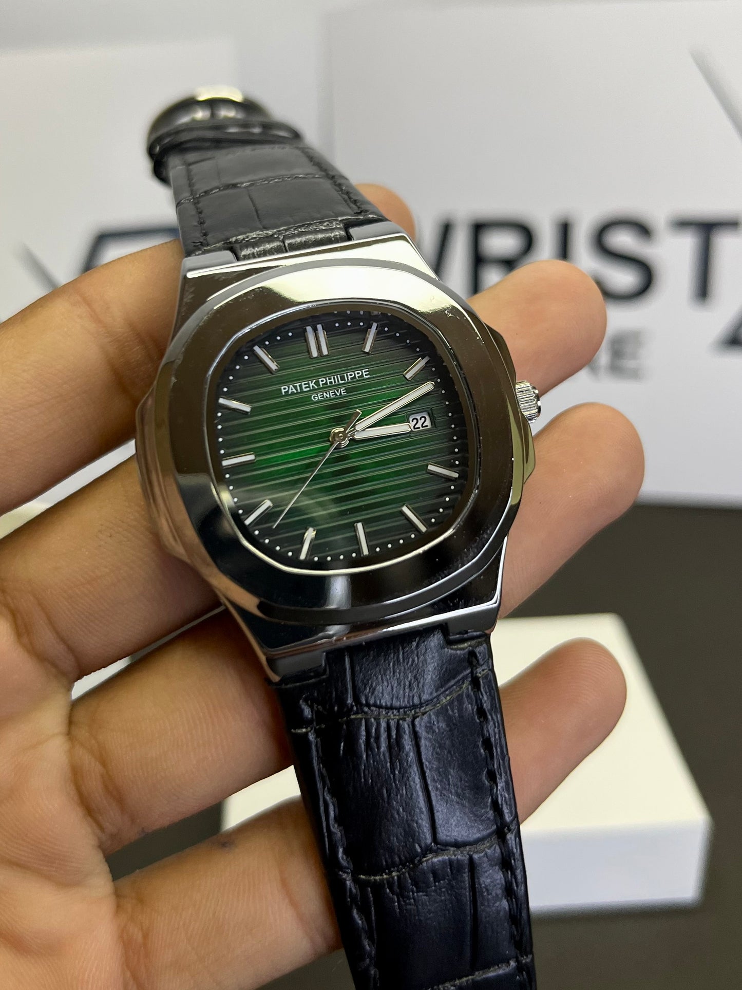 Pp black strap with green dial