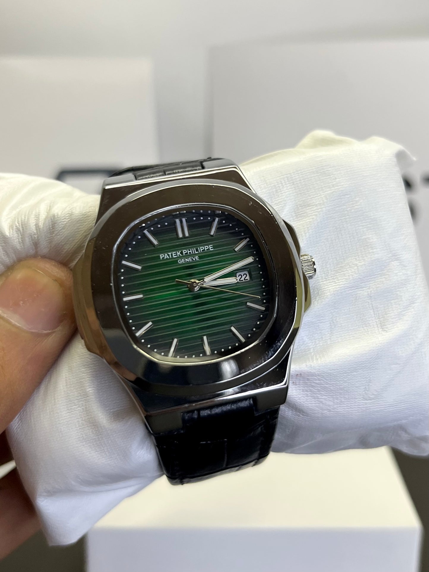 Pp black strap with green dial