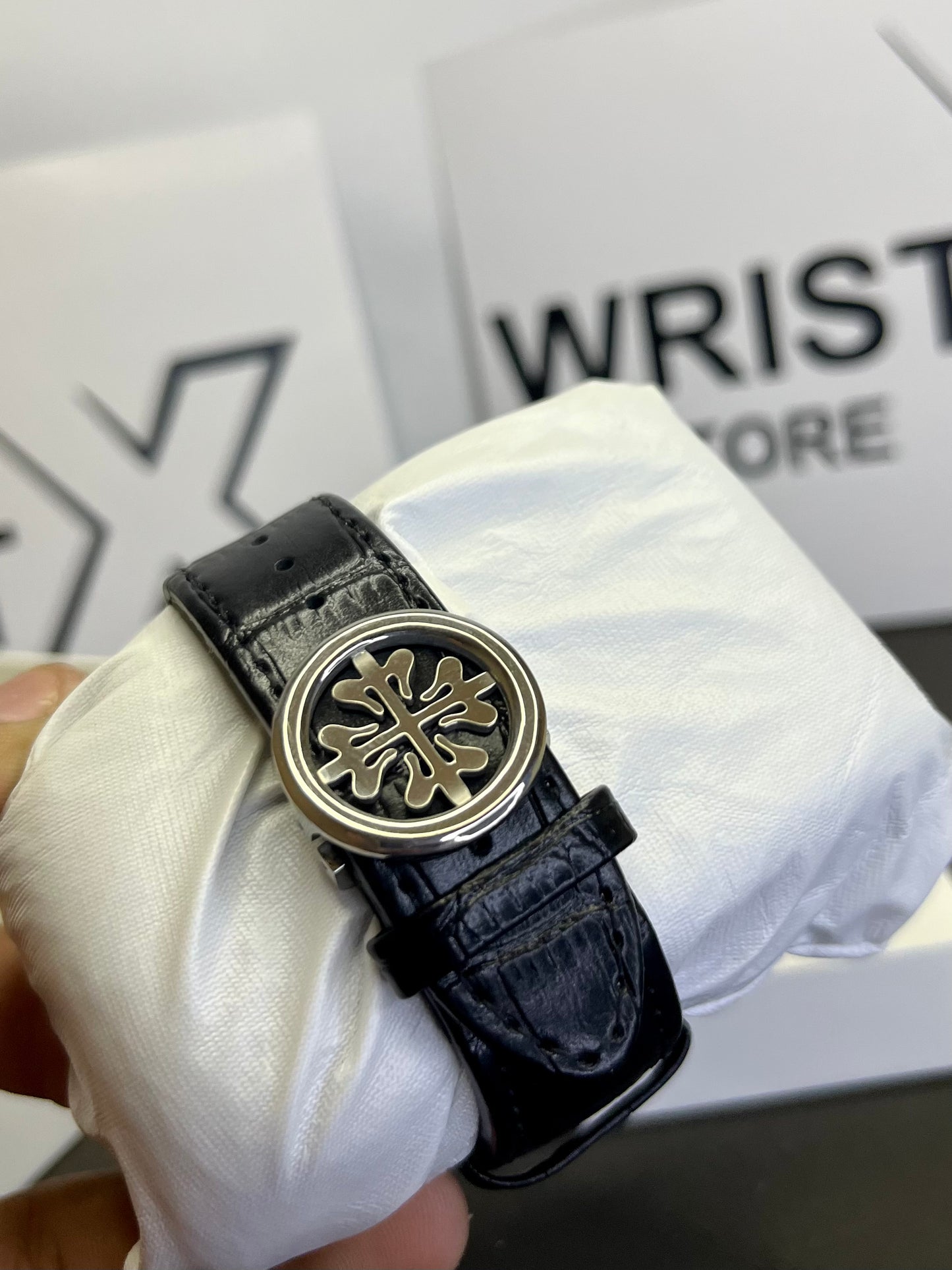 Pp black strap with white dial