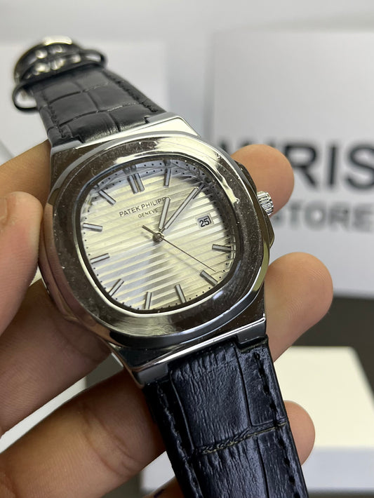 Pp black strap with white dial