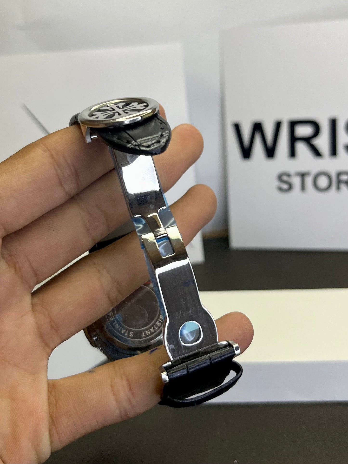 Pp black strap with white dial